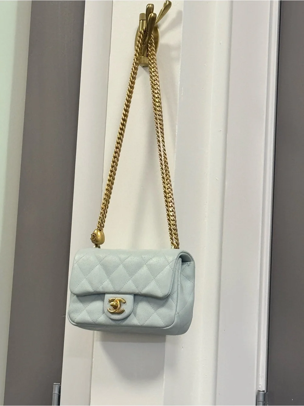 CHANEL- Light Blue Quilted Shoulder Bag with Gold Chain and Heart Crushed